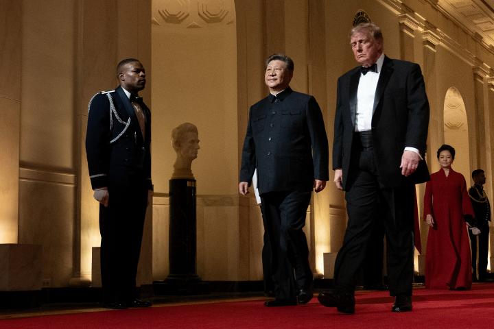 US President Donald Trump and China's President Xi Jinping arrive for a State Dinner in the East Room of the White House in Washington, DC, on September 24, 2026. President Xi is on a State visit to the United States from September 23 to 25. Brendan Smialowski / AFP