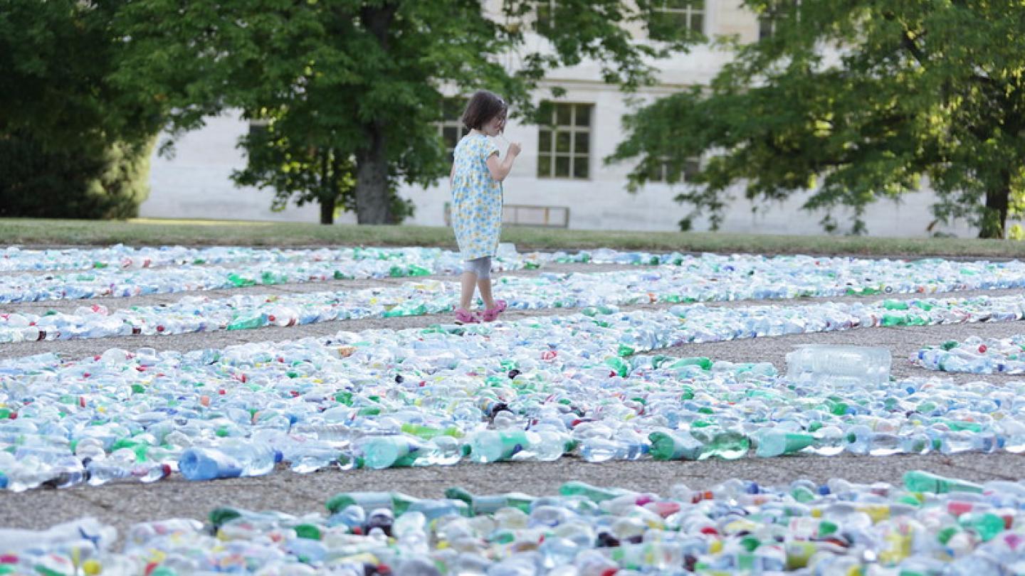 A Child Explores 'Recycling Labyrinth' Art Installation at U.N. Office Geneva, by United States Mission Geneva, CC BY-ND 2.0