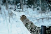 Militia member holds commercial DJI drone for take off. Credit: unsplash