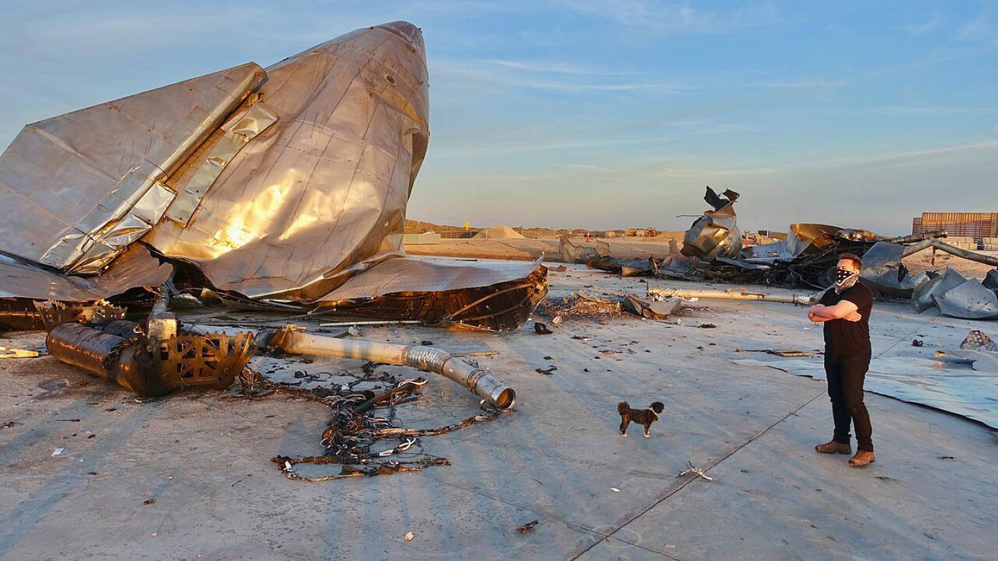 SpaceX CEO Elon Musk views the wreckage of his Starship SN8 in 2020. Photo: Steve Jurvetson via Wikimedia.