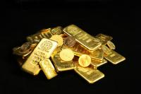 Gouden munten en baren