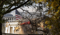 The demolition of the East Wing in progress last October. Photo: Wikimedia.