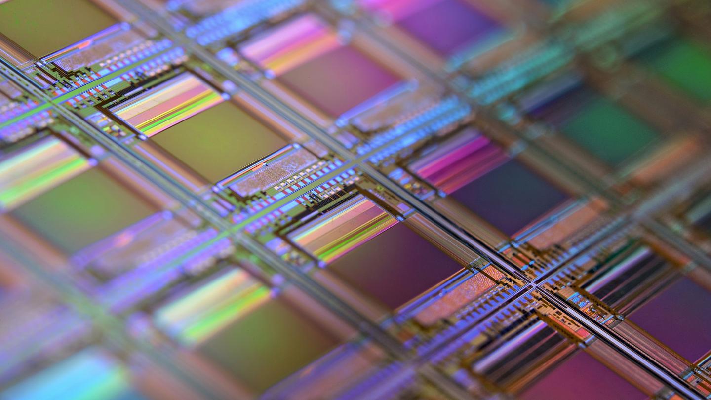 A silicon wafer with microchips including microscopic transistors and circuits. Photo: by Laura Ockel on Unsplash.