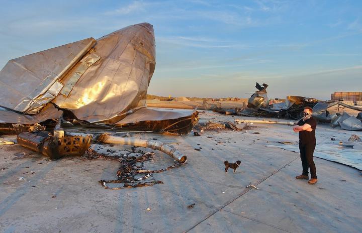 SpaceX CEO Elon Musk views the wreckage of his Starship SN8 in 2020. Photo: Steve Jurvetson via Wikimedia.
