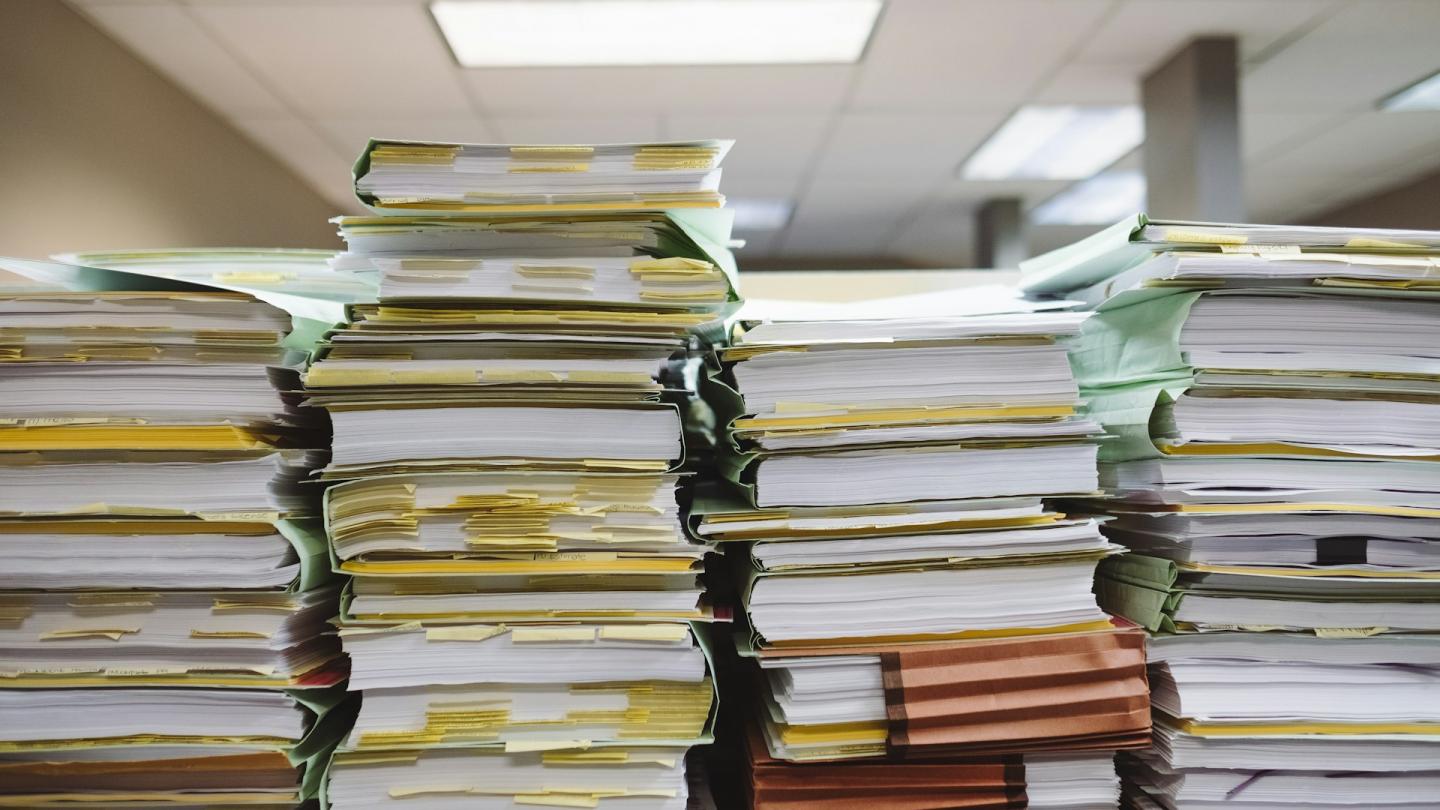 Paperwork. Photo: Wesley Tingy/Unsplash.