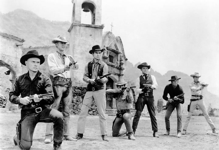 Cast publicity photo of the original 1960 version of the Magnificent Seven. Photo via Wikimedia CC-BY-2.0.