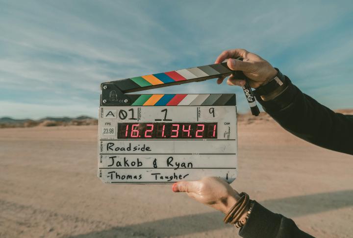 Clapper board. Photo via Unsplash.