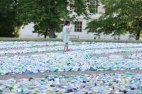 A Child Explores &#039;Recycling Labyrinth&#039; Art Installation at U.N. Office Geneva, by United States Mission Geneva, CC BY-ND 2.0